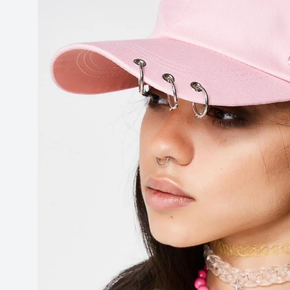 Pink pierced baseball cap